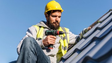 man working roof front view 1 1